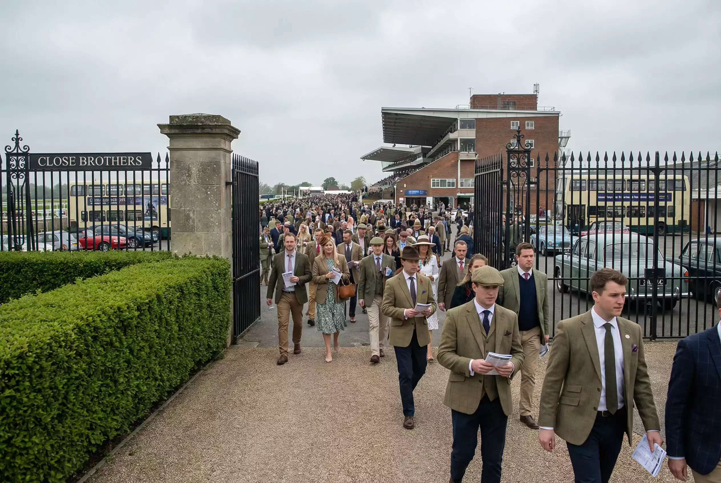 Southwell Racecourse entrance gate on a race day with racegoers arriving