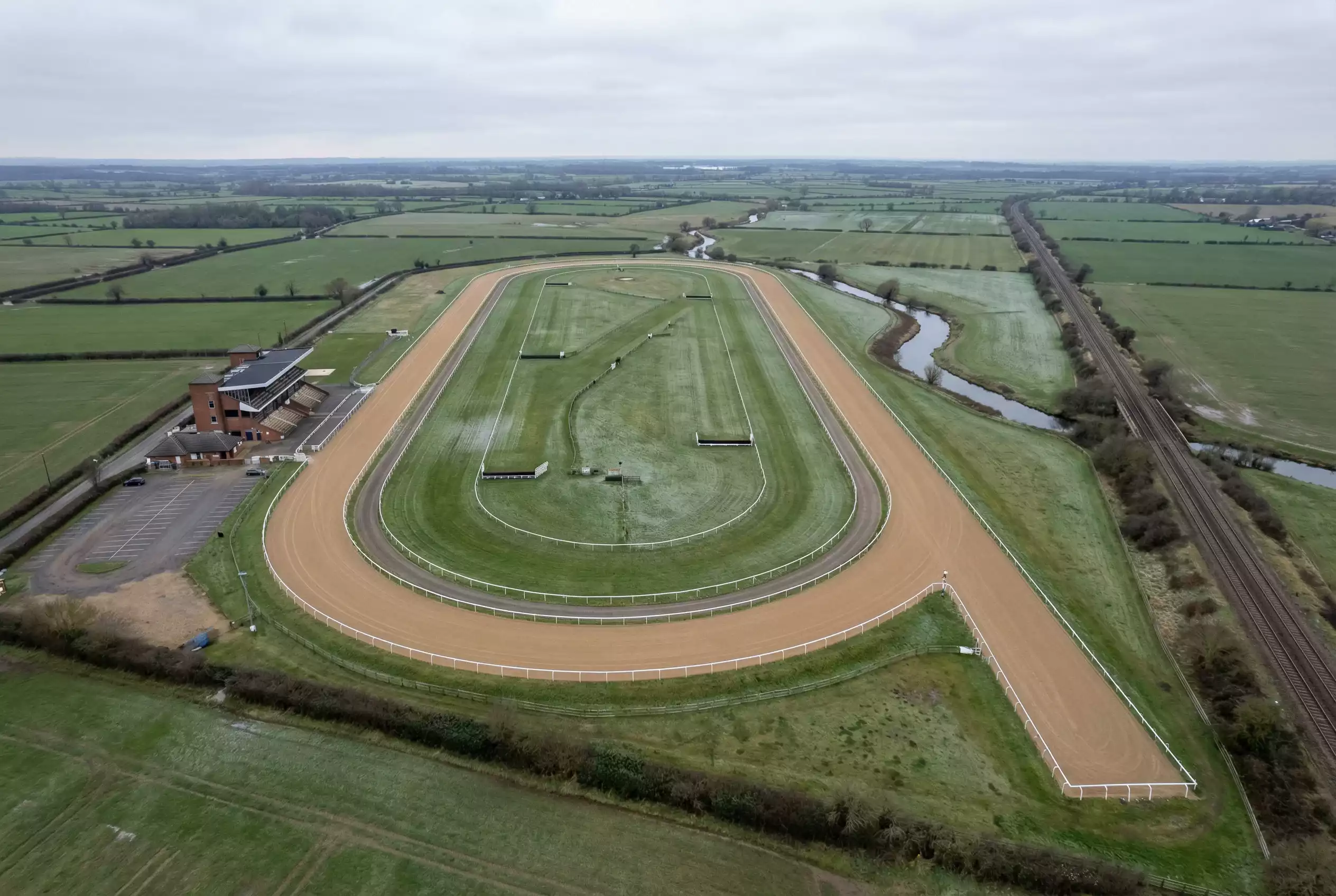 Aerial view of Southwell Racecourse showing the left-handed oval all-weather track and adjacent National Hunt turf course